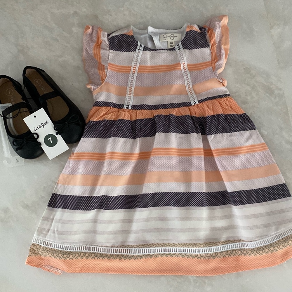 Girl’s flutter sleeve dress and Mary Jane shoes